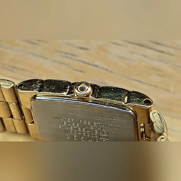 Seiko Ladies Black dial, 2 hand movement gold case and bracelet w/diamond at 12 - Picture 4 of 10